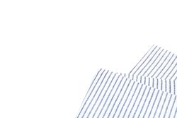 Folded fabric napkin isolated on plain background