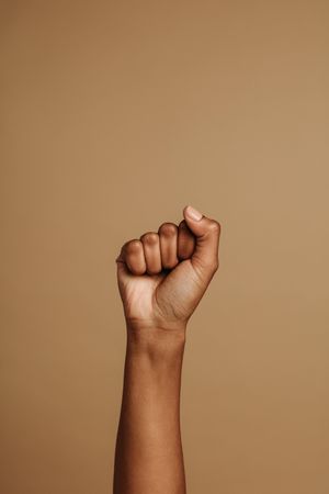 Raised fist symbolizing the Black lives matter movement