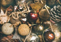 Rustic holiday tree decorations, pine cones, balls and baubles