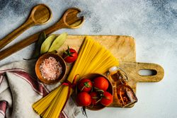 Top view of pasta cooking concept on kitchen counter