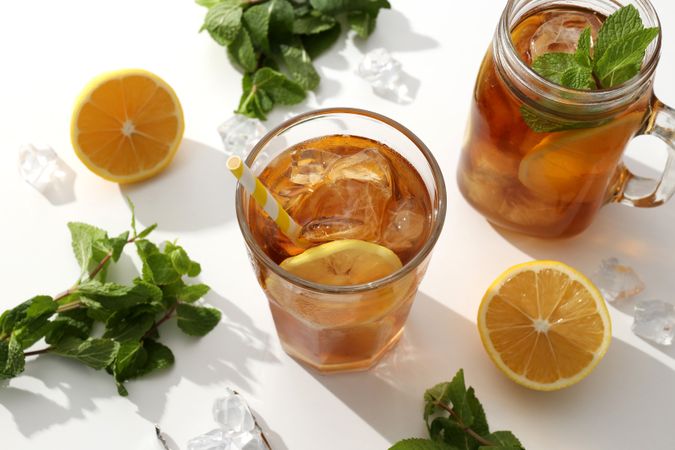 Cold tea with fresh oranges and mint leaves