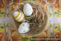 Easter decorated eggs in a basket with dried marijuana 4d9NEb