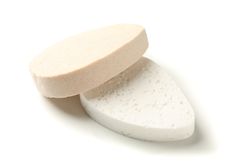 Bath sponges isolated on blank background, closeup
