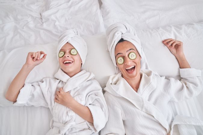 Mother and son during spa procedures at home