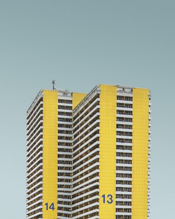 Yellow buildings against a blue sky