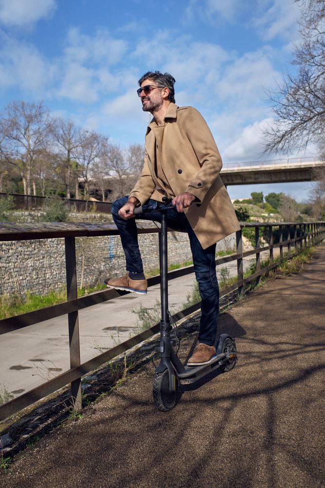 Man on scooter in park