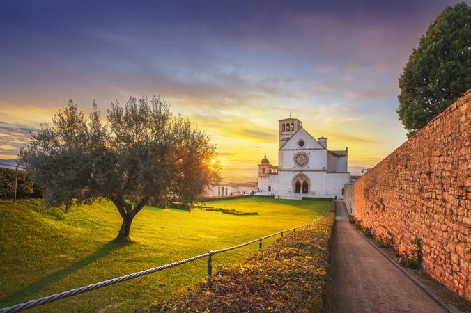 Assisi, San Francesco Basilica church at sunset. Umbria, Italy.