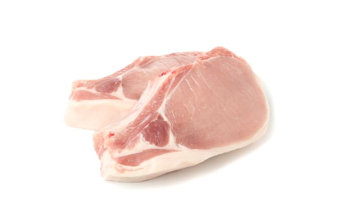 Raw meat for steak isolated on light background