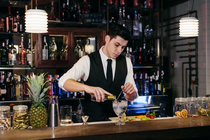 Barman working making drinks