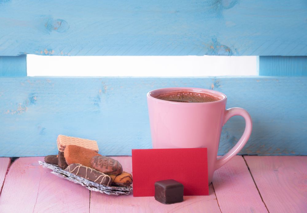 Coffee with cookies and a blank message card
