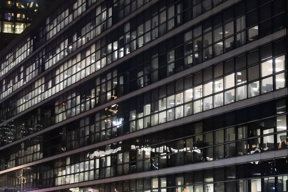 Lit commercial building by night