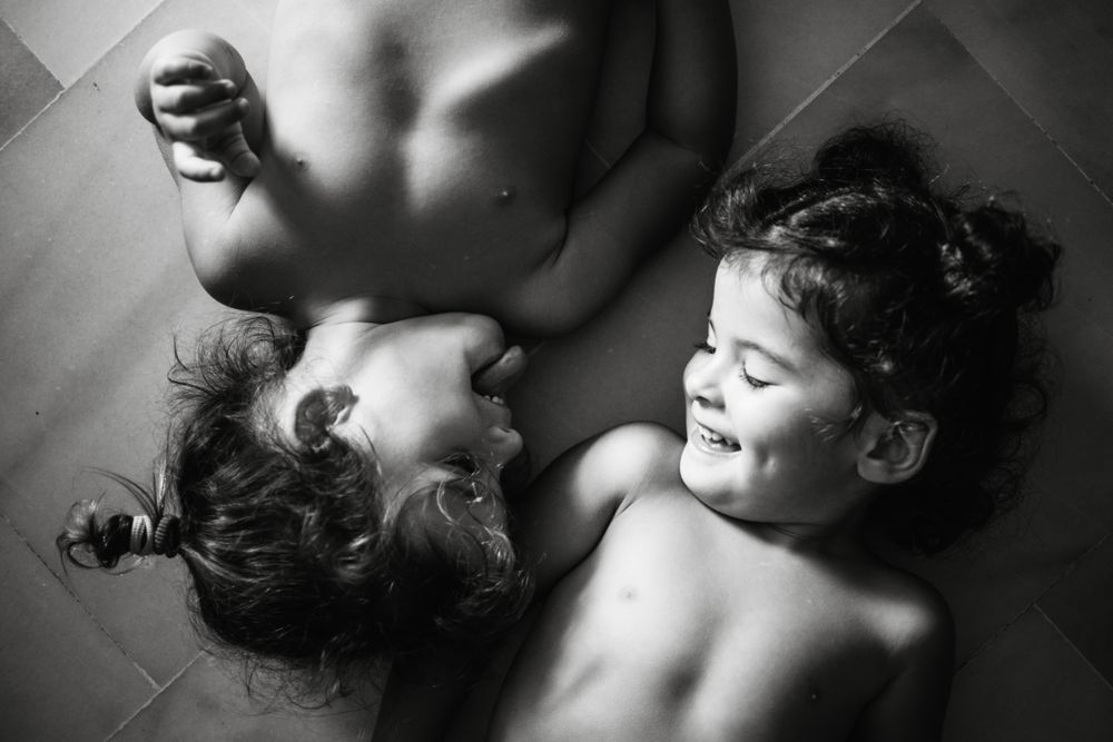 Cute little girls playing at home