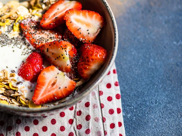 Healthy breakfast bowl with oatmeal and strawberry
