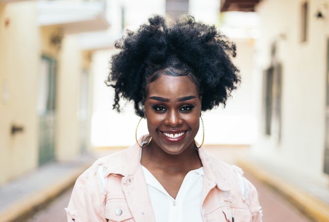 Portrait of a pretty Black woman with afro hair