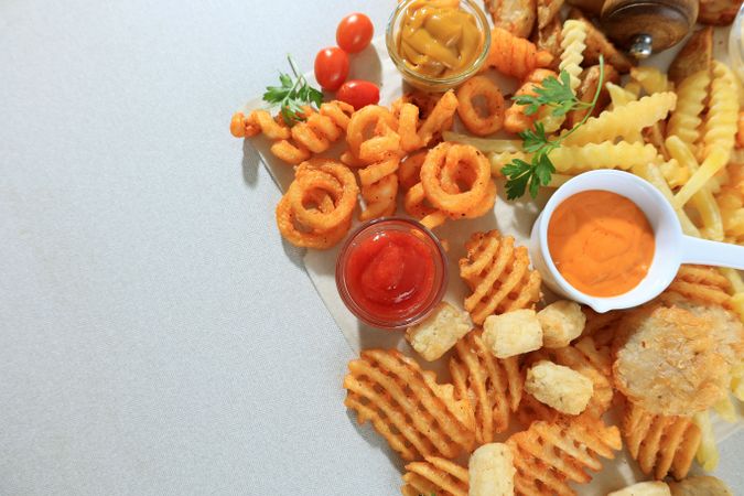 Top View of Assorted Crispy Chips and Potatoes