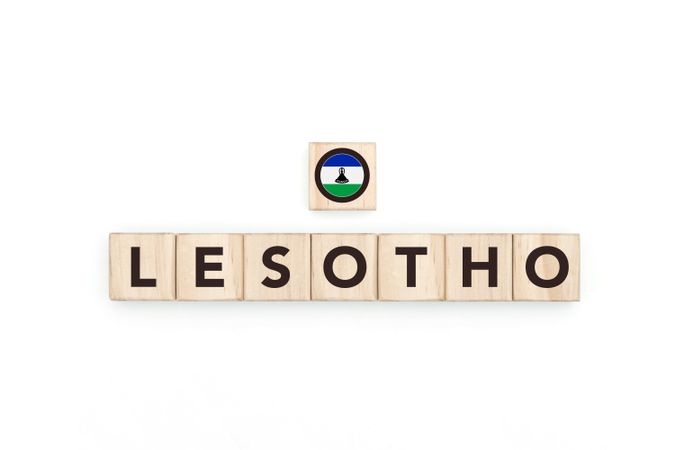 Wooden blocks bearing the name and flag of Lesotho.