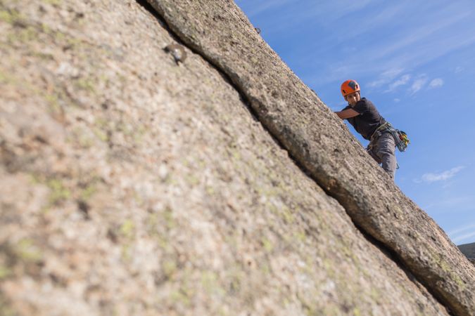 Man climbing a rock
