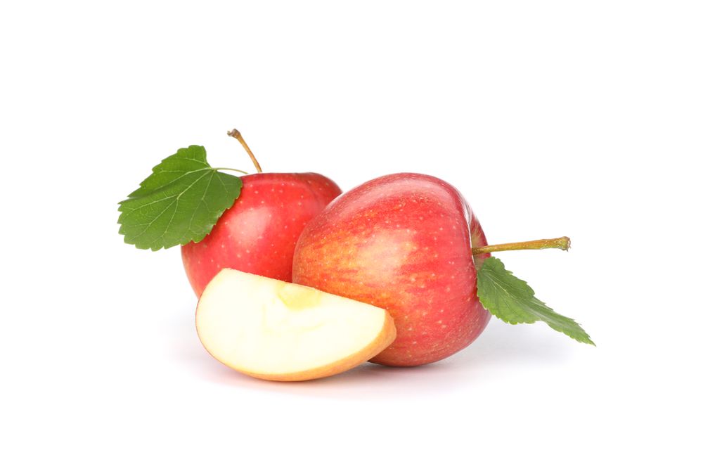 Sweet red apples isolated on light background