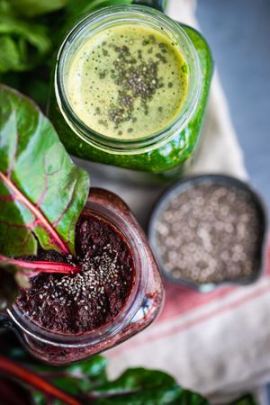 Close up of beet and green smoothies with chia seeds