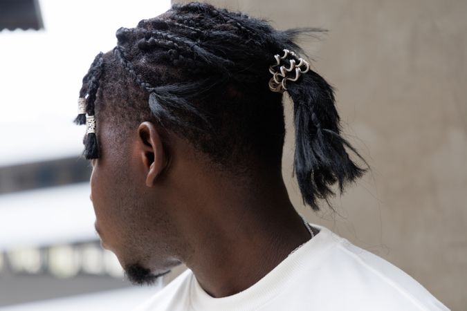 Back of man's head with braided hairstyle