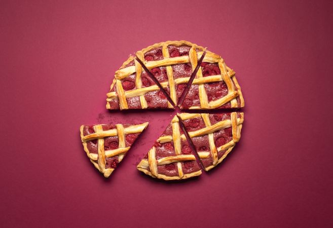 Sliced raspberry pie. Lattice crust classic pie. Raspberry tart
