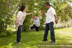 Young Hispanic Family Having Fun in the Park bGRnEv