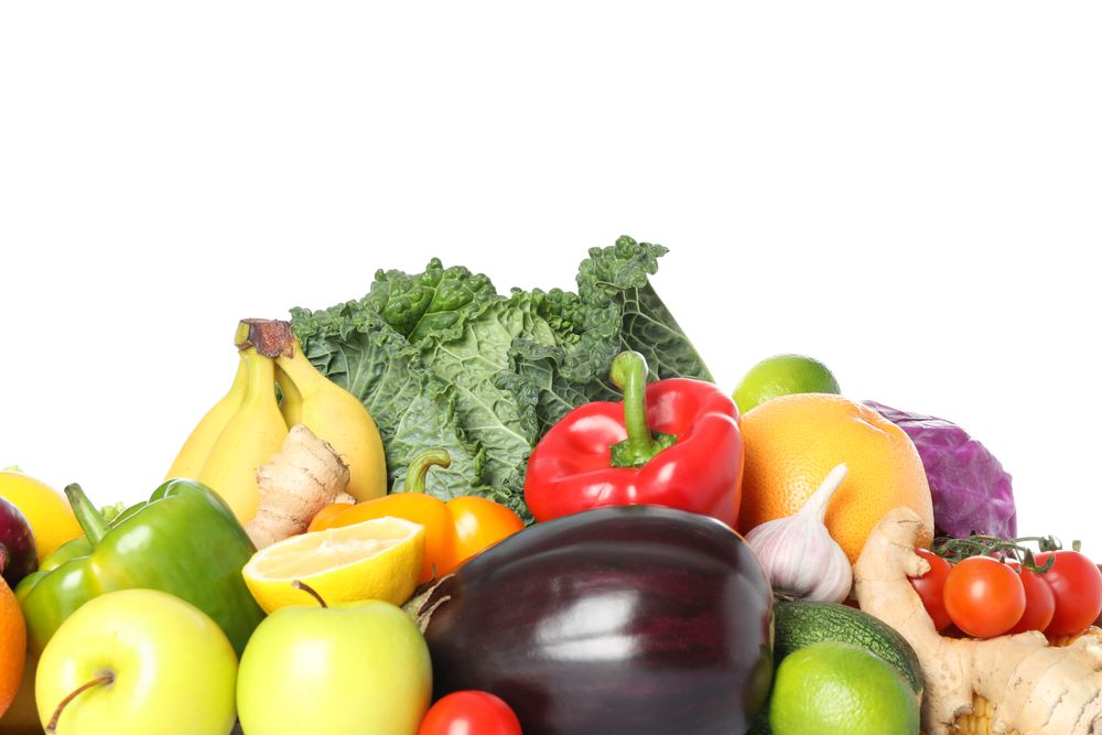 Composition with fresh vegetables and fruits isolated on blank background