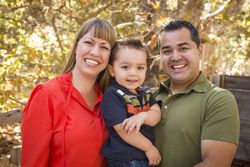 Happy Family Posing for A Portrait