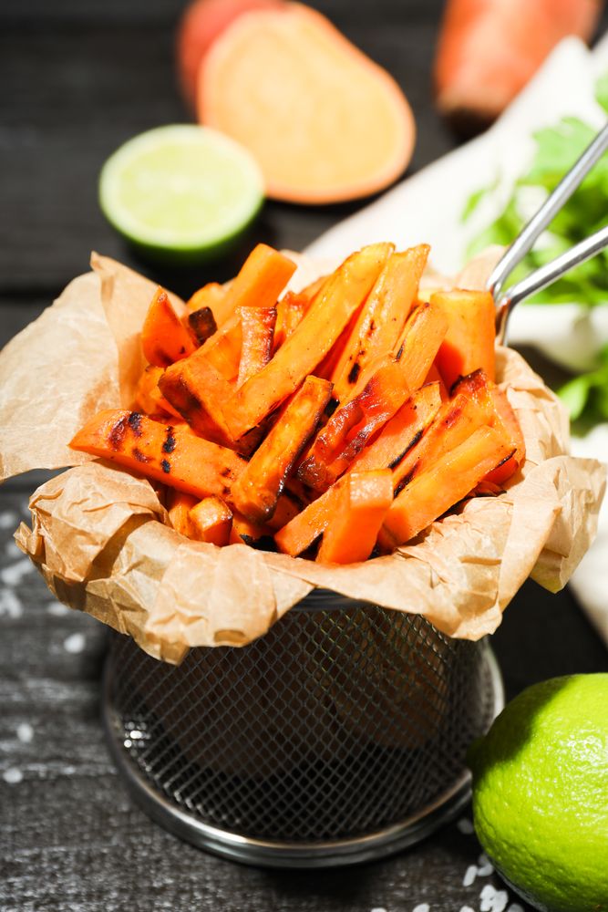 Concept of tasty food - sweet potato fries