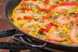 Traditional spanish paella cooked in a pan
