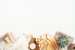 Top view of eco-friendly kitchen accessories and bath accessories with copy space