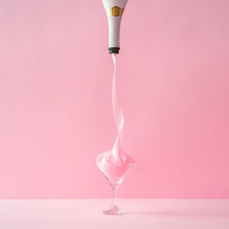 Champagne bottle with pink party ribbon