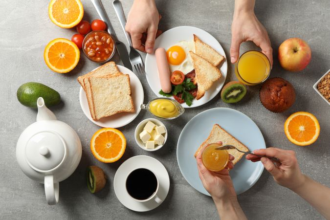 Top view of two people eating breakfast