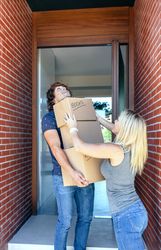 Couple moving into their new home