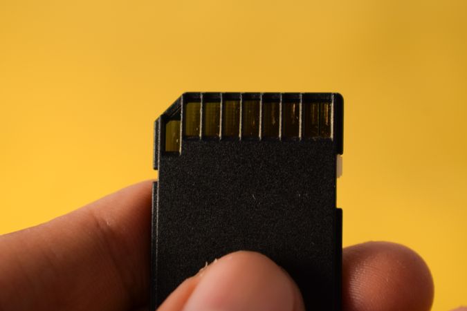 Close up of SD card in hand