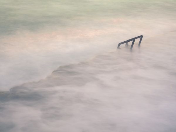 Cloudy fog over waving sea