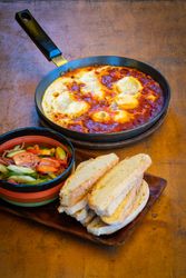 Delicious meal served on wooden table