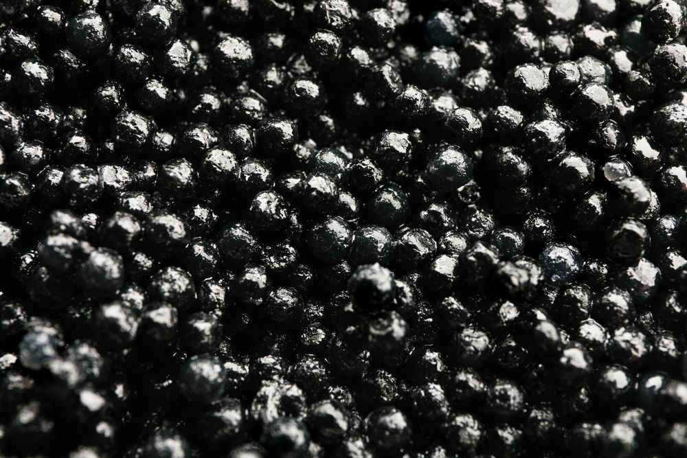 Delicious caviar as background, close up