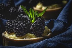 Homemade small cake with blackberries
