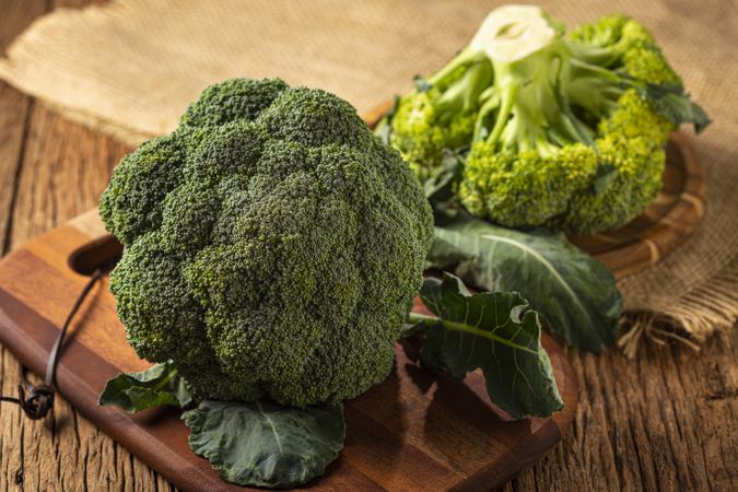 Green organic broccoli on the table.
