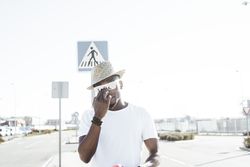 Modern man wearing sunglasses in sunlight