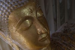 head of gold buddha image in Wat Non Kum, Nakhonratchasima Province, Thailand, public domain
