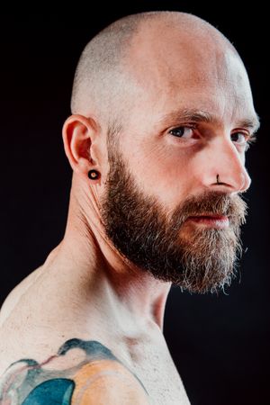 Pensive adult bearded man