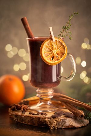 Glass of mulled wine with orange