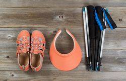 Brand new outdoor walking accessories on rustic wood