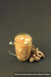 Indonesian drink made from young coconut, ginger, palm sugar, and coconut milk 42aMd5