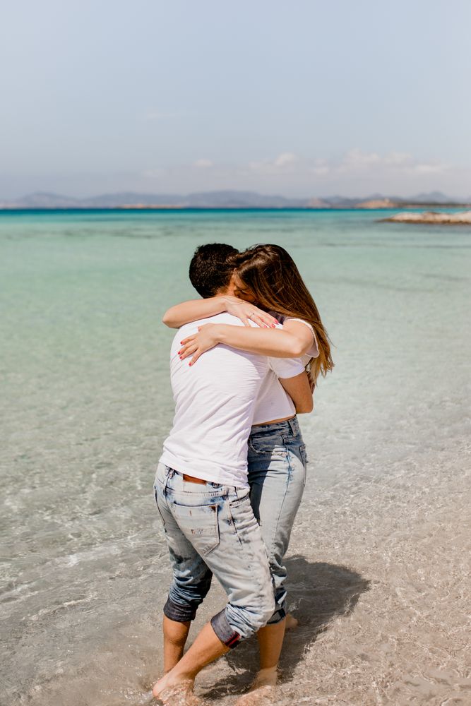 Amorous couple bonding in sea water