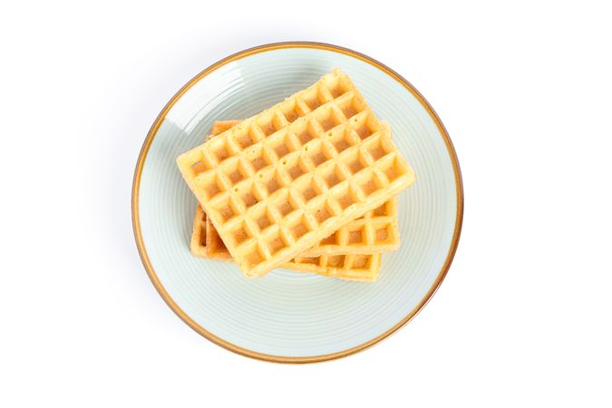 Waffles on plate isolated on blank background