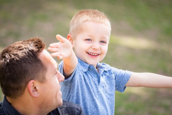 Father and Son Together At The Park