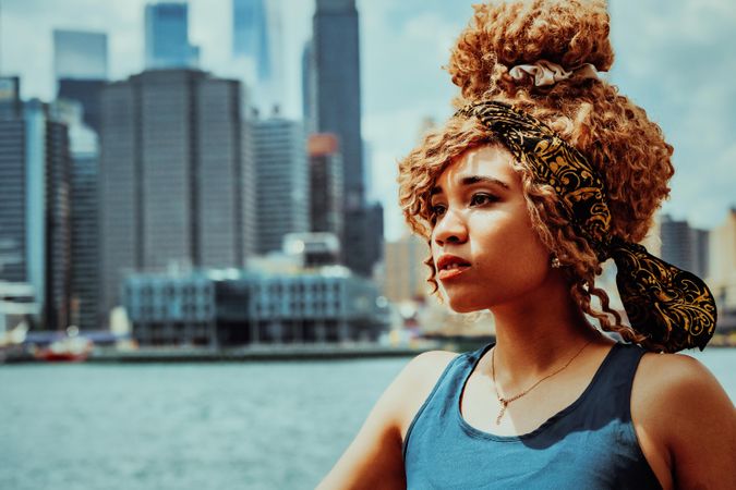 Close up portrait of young Black woman with Hudson River in the background
